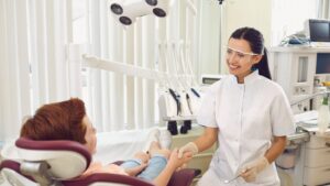 dentist and patient shaking hands