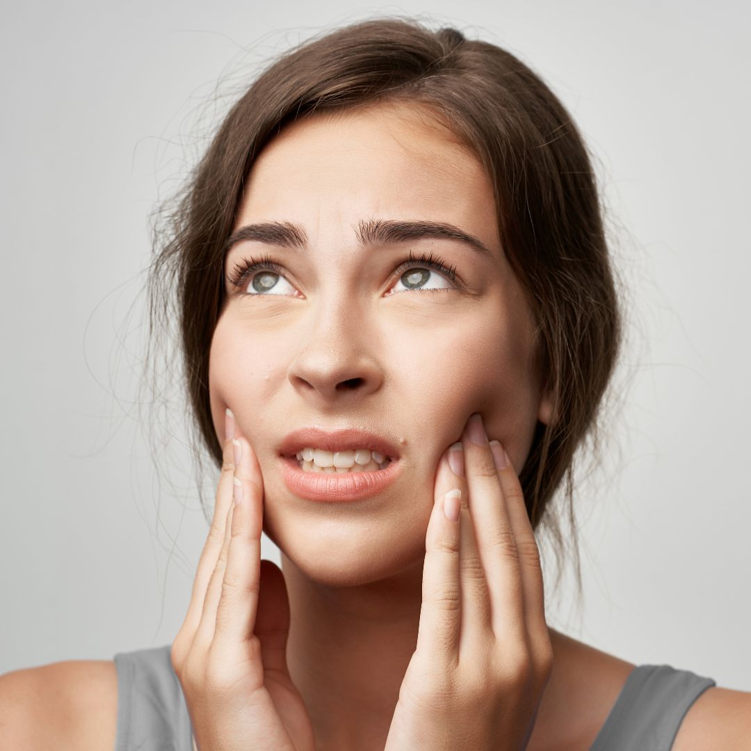 woman with tooth pain