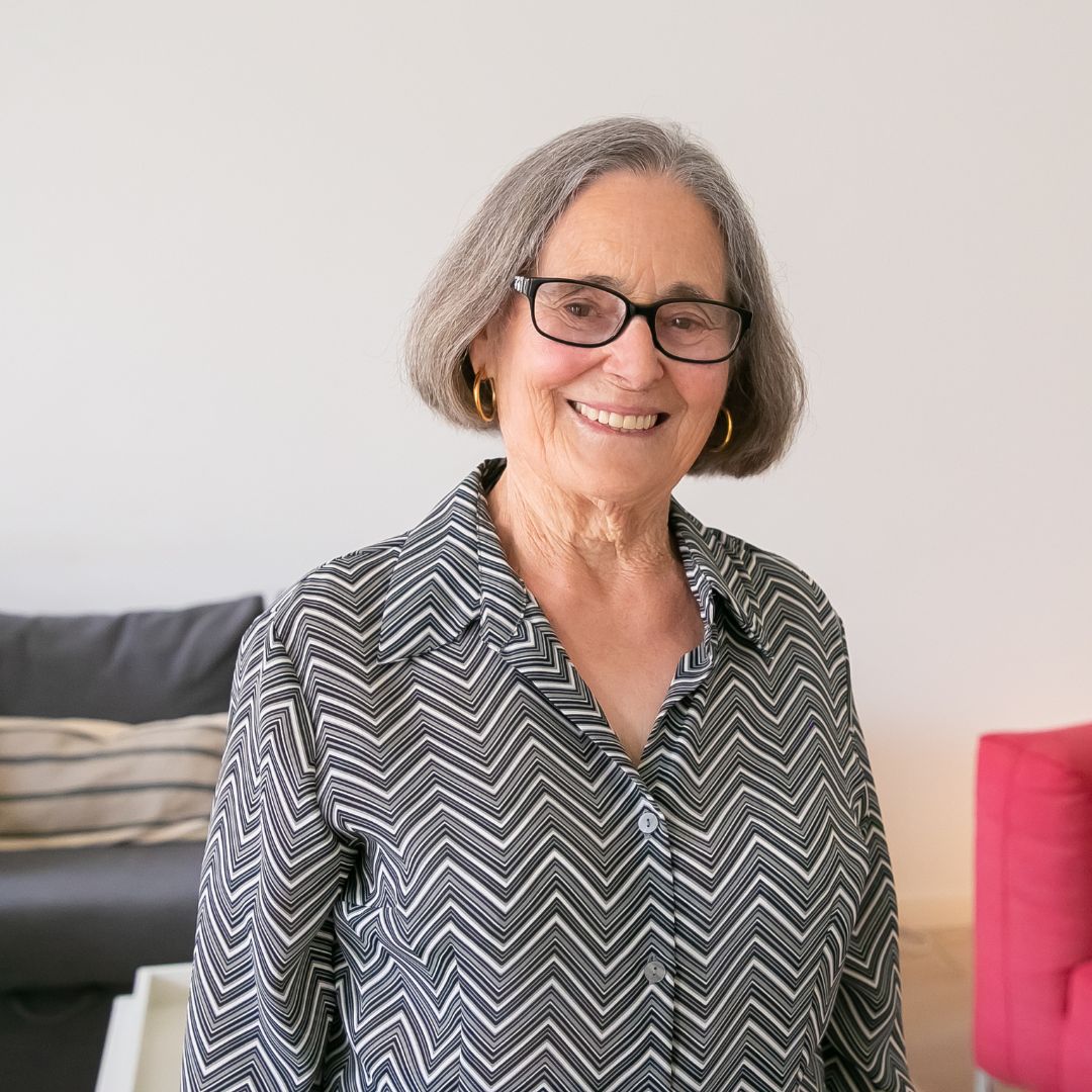 an older woman smiling