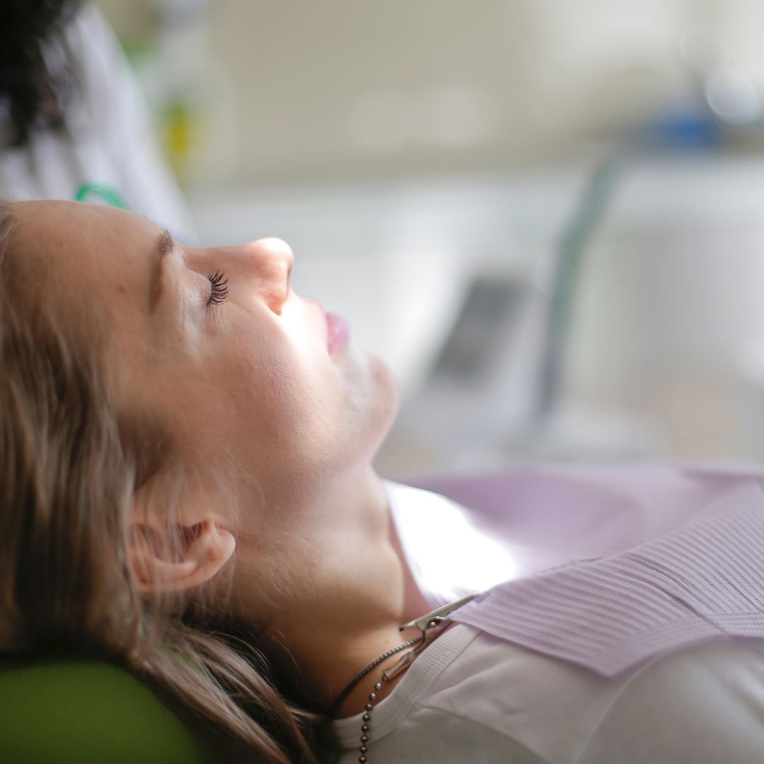 Woman relaxing at the dentist's office