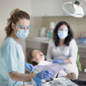 dentists with patient
