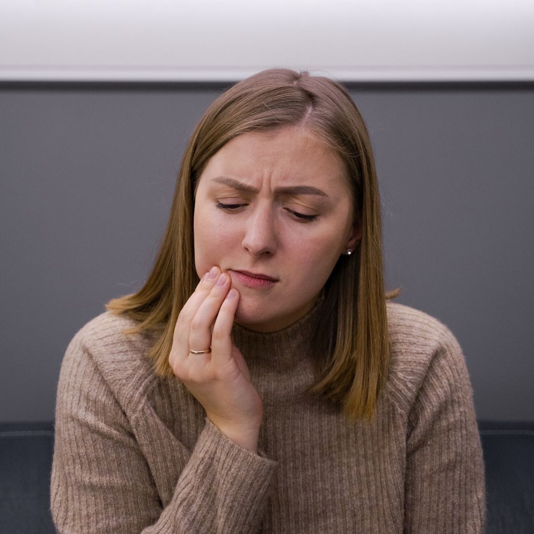 Woman with a toothache,