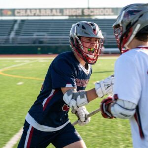 Lacrosse player communicating easily while wearing a custom mouthguard.